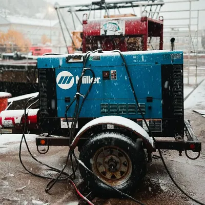 Portable generator on a wheeled trailer outdoors